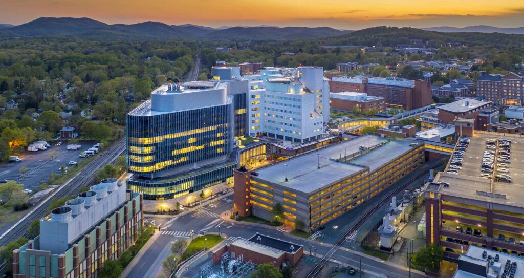 UVA Medical Center against the backdrop of the Blue Ridge Mountains