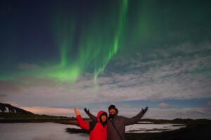 Ayush Doshi in front of Northern lights