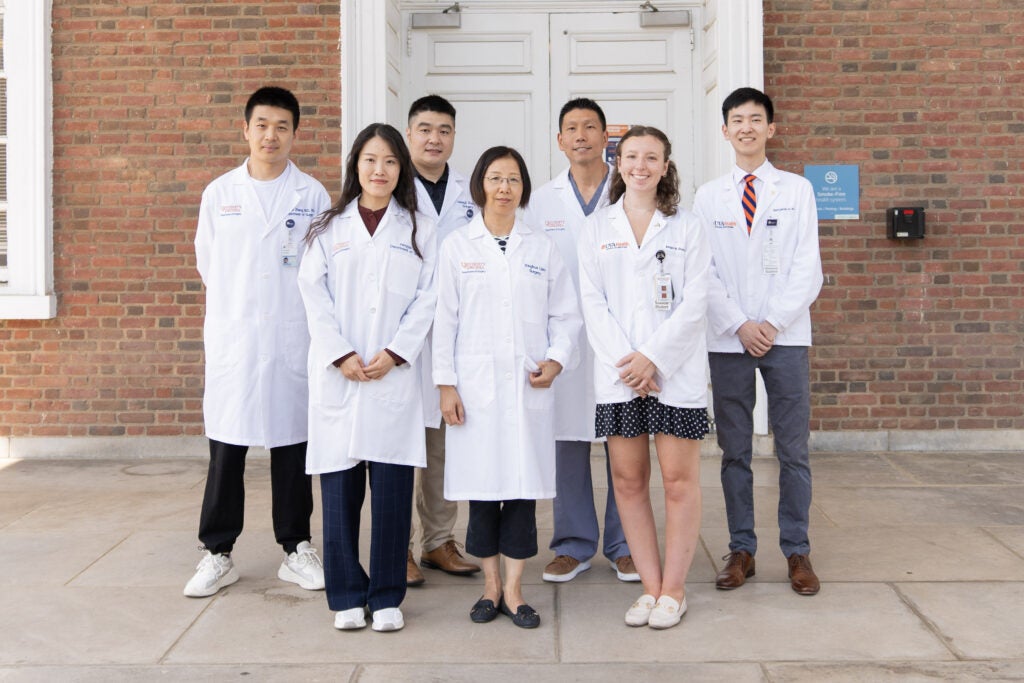 Drs. Tsung and Zhang Lab Members on the steps of the UVA School of Medicine 2023