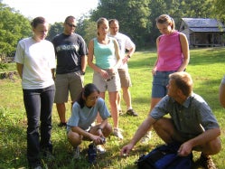 Phot of Dr. Chris Holstege with toxicology fellows on a toxic plant/mushroom hunt at Humpback Rocks.
