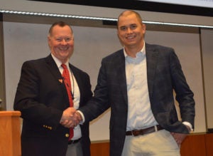Dr. Randy Canterbury, Senior Associate Dean for Education presents a Dean’s Award for Excellence in Teaching to Dr. Winston Gwathmey, Associate Professor of Orthopaedic Surgery.