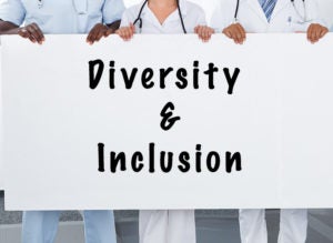 Hands holding Diversity and Inclusion sign