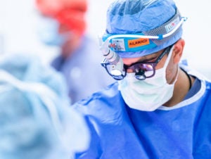 photo of surgeon in scrubs during a heart surgery at uva