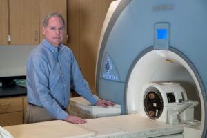Photo: Biomedical engineer John Mugler, who pioneered new technologies that improved MRI imaging, has been named to the National Academy of Inventors. (Photo by Dan Addison, University Communications)
